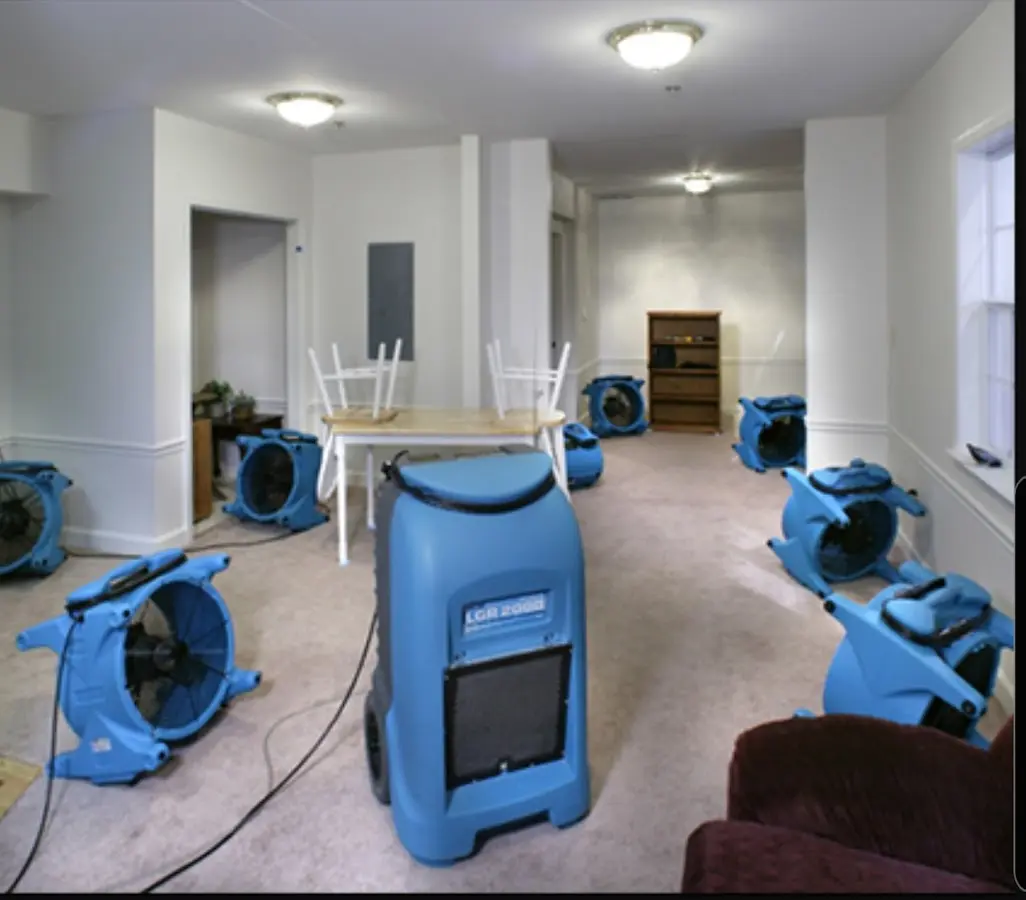 Air movers and dehumidifier setup for Water Damage Restoration in Roswell